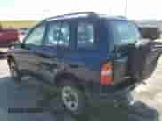 2002 Chevrolet Tracker with VIN 2CNBE13C926933455, listed as a Copart auction lot 58235764 with 189,629 mi miles and Salvage title. Bid and sale history available at DreamBid. Image 2.