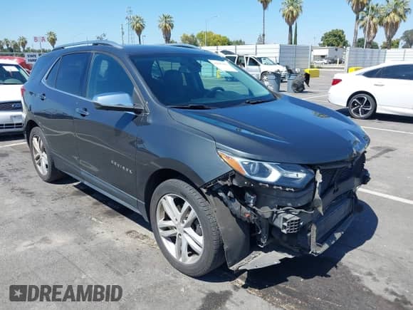 2020 Chevrolet Equinox Premier with VIN 3GNAXPEX6LS612027, listed as a IAAI auction lot 42607493 with 203,436 mi miles and . Bid and sale history available at DreamBid. Image 1.