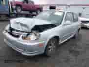 2005 Hyundai Accent GLS z VIN KMHCG35C25U359293, wystawiony jako IAAI lot #41233474 z przebiegiem 148 344 mil mil oraz . Historia ofert i sprzedaży dostępna na DreamBid. Obrazek 17.