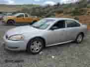 2014 Chevrolet Impala LT with VIN 2G1WB5E38E1133789, listed as a Copart auction lot 59295225 with 176,754 mi miles and Salvage title. Bid and sale history available at DreamBid. Image 1.