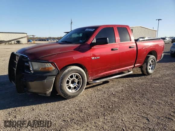 2010 Dodge 1500 ST with VIN 1D7RB1GP8AS203580, listed as a Copart auction lot 87037234 with 219,074 mi miles and Salvage title. Bid and sale history available at DreamBid. Image 1.