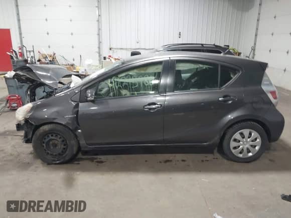 2014 Toyota Prius One z VIN JTDKDTB32E1573148, wystawiony jako IAAI lot #42295986 z przebiegiem 90 186 mil mil oraz . Historia ofert i sprzedaży dostępna na DreamBid. Obrazek 15.