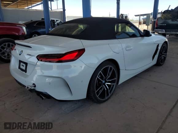 2020 BMW Z4 sDrive30i with VIN WBAHF3C0XLWW60530, listed as a Copart auction lot 57099555 with 20,464 mi miles and Salvage title. Bid and sale history available at DreamBid. Image 3.
