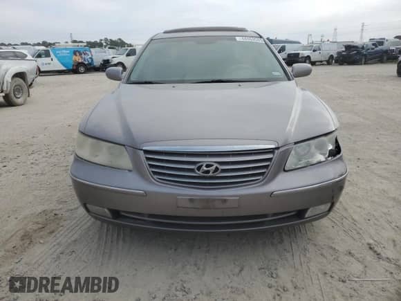 2006 Hyundai Azera SE с VIN KMHFC46F16A064812, выставлен на аукционе Copart как лот 44469585 с пробегом 225 153 миль миль и Списание • Salvage title. История ставок и продаж доступна на DreamBid. Изображение 5.