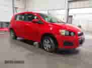 2014 Chevrolet Sonic LT z VIN 1G1JD6SH8E4164720, wystawiony jako IAAI lot #43169999 z przebiegiem 91 833 mil mil oraz . Historia ofert i sprzedaży dostępna na DreamBid. Obrazek 1.