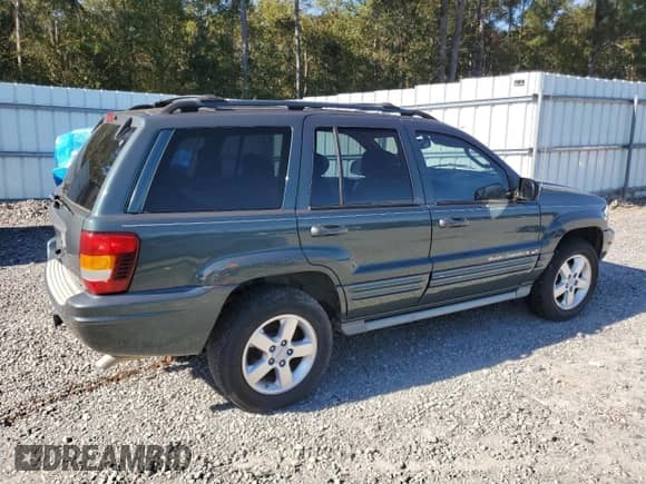 2003 Jeep Grand Cherokee Overland с VIN 1J8GW68J13C502699, выставлен на аукционе Copart как лот 89680615 с пробегом 200 013 миль миль и Чистый • Clean title. История ставок и продаж доступна на DreamBid. Изображение 3.