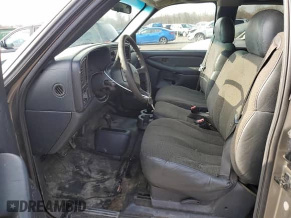 2001 Chevrolet Silverado 1500 LS z VIN 1GCEK19V21E103039, wystawiony jako Copart lot #83390404 z przebiegiem 190 176 mil mil oraz Szkoda całkowita • Salvage title. Historia ofert i sprzedaży dostępna na DreamBid. Obrazek 7.