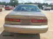 1999 Toyota Camry LE z VIN 4T1BF22K2XU932314, wystawiony jako Copart lot #69739255 z przebiegiem 176 233 mil mil oraz Szkoda całkowita • Salvage title. Historia ofert i sprzedaży dostępna na DreamBid. Obrazek 6.