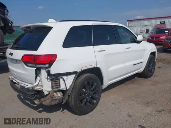 2020 Jeep Grand Cherokee Altitude with VIN 1C4RJFAG5LC126201, listed as a IAAI auction lot 43155385 with 75,215 mi miles and . Bid and sale history available at DreamBid. Image 4.