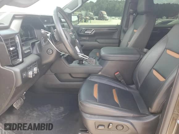 2023 GMC Sierra 1500 AT4 with VIN 1GTUUEEL0PZ315022, listed as a Copart auction lot 82069025 with 59,241 mi miles and Salvage title. Bid and sale history available at DreamBid. Image 7.