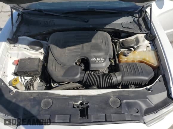 2013 Dodge Charger SXT Plus with VIN 2C3CDXHG1DH542659, listed as a Copart auction lot 85279285 with 153,280 mi miles and Salvage title. Bid and sale history available at DreamBid. Image 11.