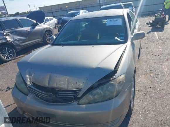 2005 Toyota Camry STD with VIN 4T1BE32KX5U084110, listed as a IAAI auction lot 43162822 with 210,556 mi miles and . Bid and sale history available at DreamBid. Image 11.