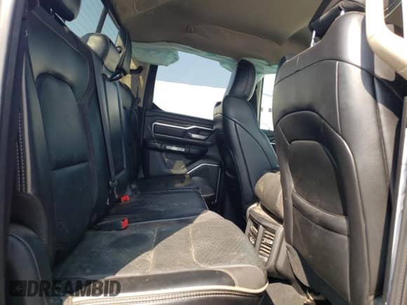 2019 Ram 1500 Laramie z VIN 1C6SRFDTXKN525165, wystawiony jako Copart lot #58856435 z przebiegiem 86 005 mil mil oraz Szkoda całkowita • Salvage title. Historia ofert i sprzedaży dostępna na DreamBid. Obrazek 10.