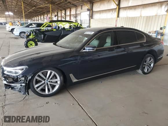 2016 BMW 7 Series 750i with VIN WBA7F0C5XGGL99115, listed as a Copart auction lot 65112705 with Not provided miles and Salvage title. Bid and sale history available at DreamBid. Image 1.