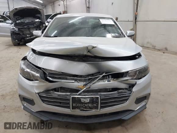 2016 Chevrolet Malibu LT z VIN 1G1ZE5ST3GF330731, wystawiony jako IAAI lot #43381521 z przebiegiem 69 236 mil mil oraz . Historia ofert i sprzedaży dostępna na DreamBid. Obrazek 6.