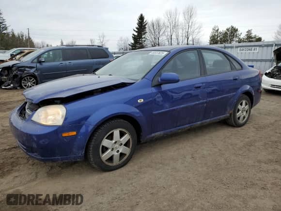 2005 Chevrolet Optra LS с VIN KL1JK59Z85K144184, выставлен на аукционе Copart как лот 48537625 с пробегом 346 711 миль миль и Списание • Salvage title. История ставок и продаж доступна на DreamBid. Изображение 1.