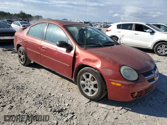 2004 Dodge Neon SXT with VIN 1B3ES56C24D634926, listed as a Copart auction lot 71637184 with 298,719 mi miles and Clean title. Bid and sale history available at DreamBid. Image 4.