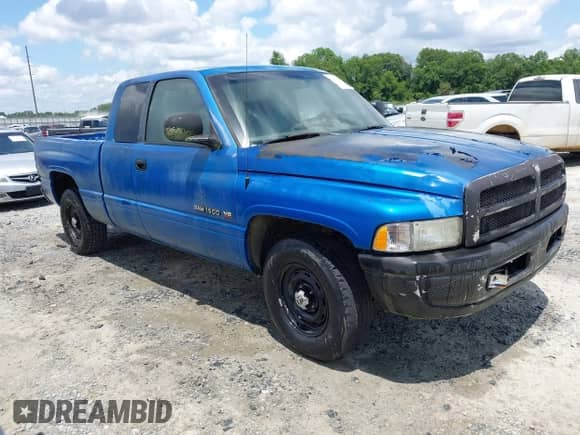 1999 Dodge 1500 with VIN 3B7HC13Y9XM582107, listed as a IAAI auction lot 42435928 with 151,959 mi miles and . Bid and sale history available at DreamBid. Image 1.