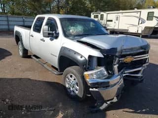 2012 Chevrolet Silverado 2500HD Work Truck with VIN 1GC1CVCG3CF202656, listed as a IAAI auction lot 43473534 with 262,707 mi miles and . Bid and sale history available at DreamBid. Image 1.