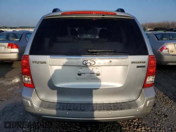 2007 Hyundai Entourage GLS с VIN KNDMC233876026198, выставлен на аукционе Copart как лот 82776623 с пробегом 161 071 миль миль и Списание • Salvage title. История ставок и продаж доступна на DreamBid. Изображение 6.