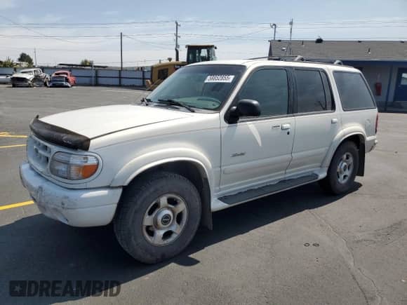1999 Ford Explorer XLT with VIN 1FMZU34E1XZA28197, listed as a Copart auction lot 58852855 with 115,367 mi miles and Salvage title. Bid and sale history available at DreamBid. Image 1.