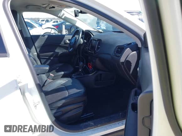 2021 Jeep Compass Limited with VIN 3C4NJCCBXMT573563, listed as a IAAI auction lot 41687325 with 75,768 mi miles and . Bid and sale history available at DreamBid. Image 5.