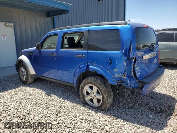 2007 Dodge Nitro SLT with VIN 1D8GT58K27W738559, listed as a Copart auction lot 59152075 with 256,526 mi miles and Salvage title. Bid and sale history available at DreamBid. Image 2.