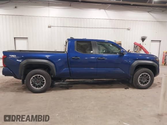 2024 Toyota Tacoma SR5 with VIN 3TMLB5JN3RM054207, listed as a IAAI auction lot 41171946 with 3,808 mi miles and . Bid and sale history available at DreamBid. Image 13.