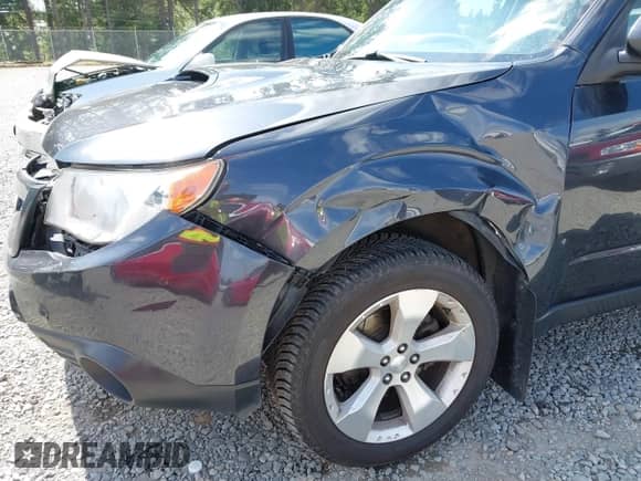 2013 Subaru Forester XT Touring with VIN JF2SHGGC0DH412616, listed as a IAAI auction lot 42533797 with 123,762 mi miles and . Bid and sale history available at DreamBid. Image 18.