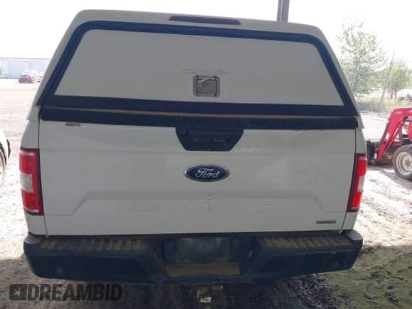 2018 Ford F-150 XL z VIN 1FTFX1EG3JKD22977, wystawiony jako IAAI lot #43146786 z przebiegiem 184 881 mil mil oraz . Historia ofert i sprzedaży dostępna na DreamBid. Obrazek 16.