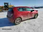 2012 Chevrolet Sonic LT with VIN 1G1JC6SH6C4143008, listed as a Copart auction lot 42904085 with 97,472 mi miles and Salvage title. Bid and sale history available at DreamBid. Image 3.
