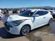 2014 Hyundai Veloster z VIN KMHTC6AD4EU213537, wystawiony jako IAAI lot #43358808 z przebiegiem 54 973 mil mil oraz . Historia ofert i sprzedaży dostępna na DreamBid. Obrazek 2.