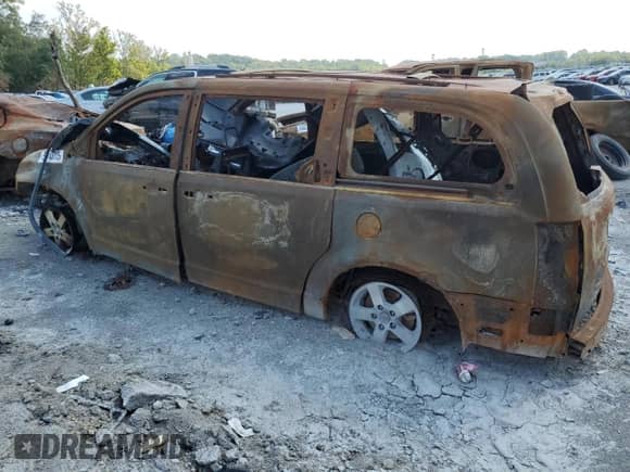 2010 Dodge Grand Caravan SXT с VIN 2D4RN5D17AR409597, выставлен на аукционе Copart как лот 54743715 с пробегом Не указан миль и Списание • Salvage title. История ставок и продаж доступна на DreamBid. Изображение 2.