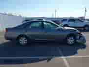 2003 Toyota Camry XLE with VIN 4T1BE32K33U719780, listed as a IAAI auction lot 43107094 with 144,249 mi miles and . Bid and sale history available at DreamBid. Image 13.