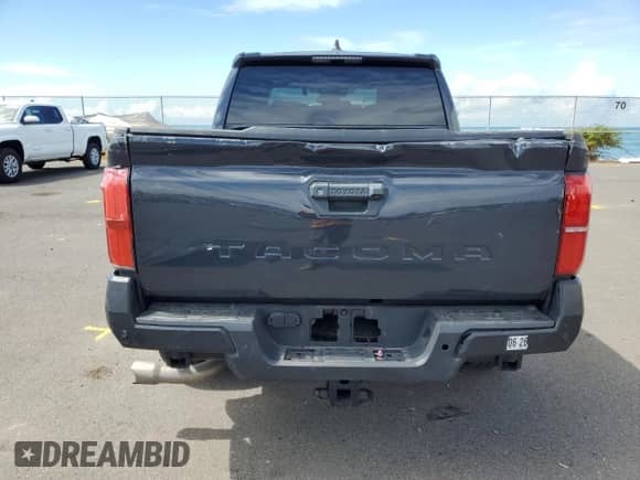 2024 Toyota Tacoma SR with VIN 3TYKD5HN7RT003129, listed as a Copart auction lot 63349125 with 15,244 mi miles and Salvage title. Bid and sale history available at DreamBid. Image 6.