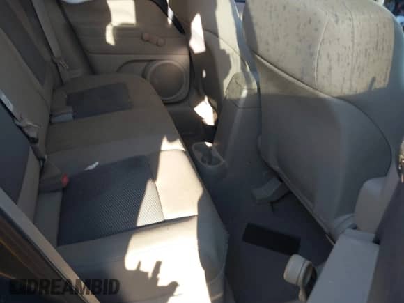 2010 Jeep Compass Sport z VIN 1J4NT1FB0AD677985, wystawiony jako IAAI lot #41348637 z przebiegiem 213 531 mil mil oraz . Historia ofert i sprzedaży dostępna na DreamBid. Obrazek 8.