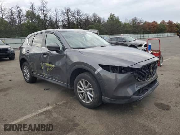 2023 Mazda CX-5 S Carbon Edition z VIN JM3KFBCMXP0132444, wystawiony jako Copart lot #71873865 z przebiegiem 22 248 mil mil oraz Szkoda całkowita • Salvage title. Historia ofert i sprzedaży dostępna na DreamBid. Obrazek 4.