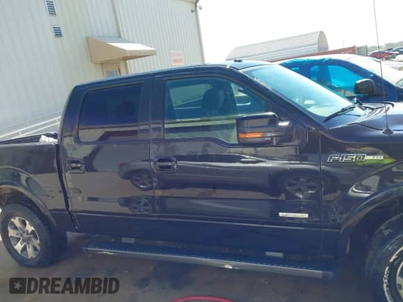 2012 Ford F-150 Lariat with VIN 1FTFW1CT9CFA42897, listed as a IAAI auction lot 43394632 with 197,979 mi miles and . Bid and sale history available at DreamBid. Image 13.