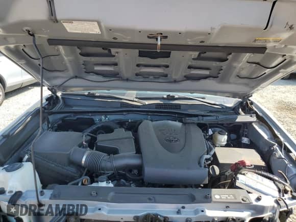 2018 Toyota Tacoma SR5 with VIN 5TFRZ5CNXJX070809, listed as a Copart auction lot 68571935 with 56,970 mi miles and Salvage title. Bid and sale history available at DreamBid. Image 11.