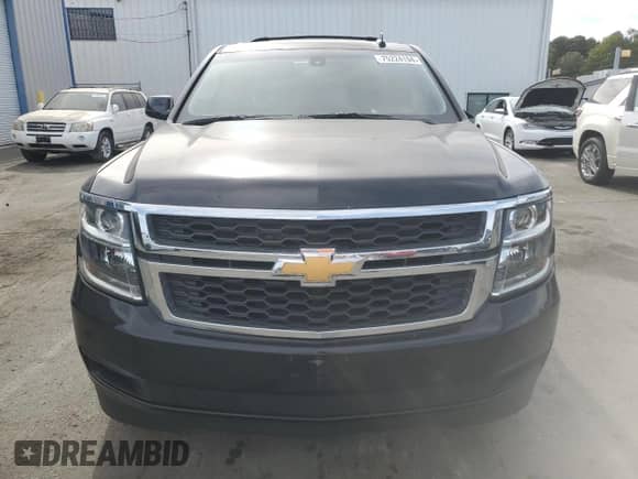 2019 Chevrolet Suburban LS with VIN 1GNSCGKC2KR297407, listed as a Copart auction lot 75224194 with 93,562 mi miles and Salvage title. Bid and sale history available at DreamBid. Image 5.