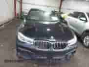 2016 BMW 7 Series 750i xDrive with VIN WBA7F2C50GG418511, listed as a IAAI auction lot 41695547 with 98,858 mi miles and . Bid and sale history available at DreamBid. Image 12.