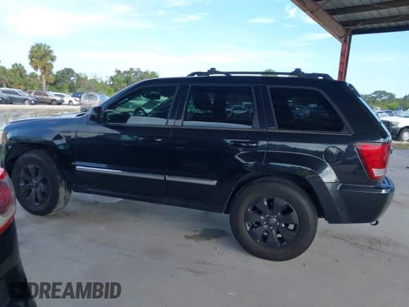 2008 Jeep Grand Cherokee Limited z VIN 1J8HR58218C209777, wystawiony jako IAAI lot #43129519 z przebiegiem 103 733 mil mil oraz . Historia ofert i sprzedaży dostępna na DreamBid. Obrazek 14.