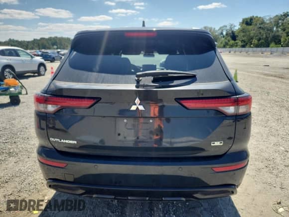 2023 Mitsubishi Outlander SE with VIN JA4J3UA85PZ013351, listed as a Copart auction lot 80062325 with 74,432 mi miles and Salvage title. Bid and sale history available at DreamBid. Image 6.