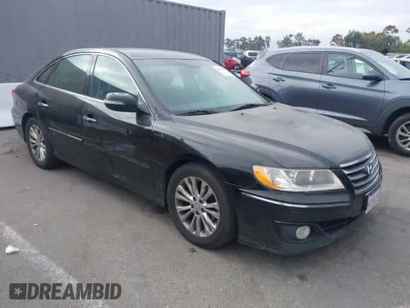 2011 Hyundai Azera Limited z VIN KMHFC4DF6BA552635, wystawiony jako IAAI lot #42816840 z przebiegiem 235 378 mil mil oraz . Historia ofert i sprzedaży dostępna na DreamBid. Obrazek 1.