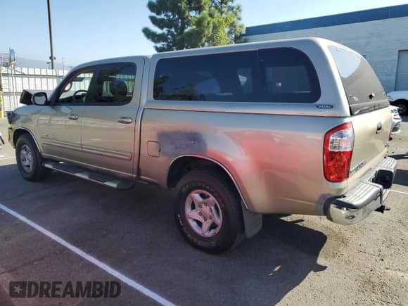 2005 Toyota Tundra SR5 с VIN 5TBET34185S496566, выставлен на аукционе Copart как лот 81779275 с пробегом 170 890 миль миль и Списание • Salvage title. История ставок и продаж доступна на DreamBid. Изображение 2.