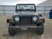 1998 Jeep Wrangler SE z VIN 1J4FY29P1WP763752, wystawiony jako Copart lot #70510885 z przebiegiem 228 480 mil mil oraz Szkoda całkowita • Salvage title. Historia ofert i sprzedaży dostępna na DreamBid. Obrazek 5.