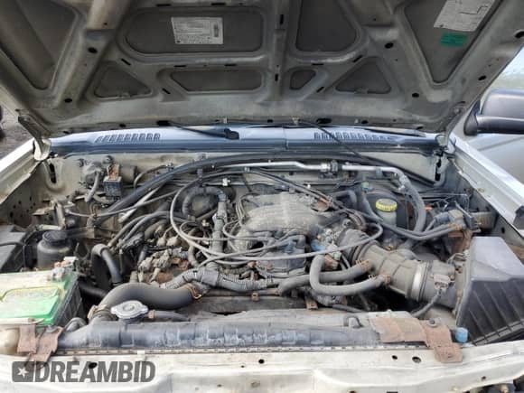 2001 Nissan Frontier SE with VIN 1N6ED27YX1C335118, listed as a Copart auction lot 58204194 with 408,869 mi miles and Non repairable. Bid and sale history available at DreamBid. Image 11.