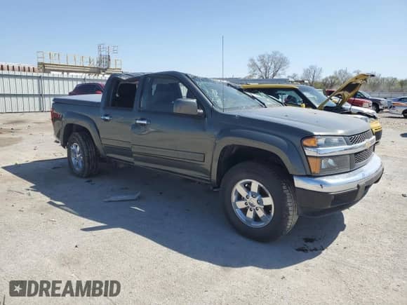 2011 Chevrolet Colorado 2LT with VIN 1GCHSDFE5B8131243, listed as a Copart auction lot 52133755 with 123,572 mi miles and Salvage title. Bid and sale history available at DreamBid. Image 4.