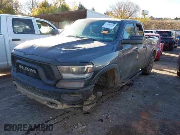 2019 Ram 1500 Rebel with VIN 1C6RRFEG6KN860990, listed as a IAAI auction lot 40904536 with 121,670 mi miles and . Bid and sale history available at DreamBid. Image 17.