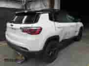 2019 Jeep Compass Latitude with VIN 3C4NJDBB7KT754348, listed as a IAAI auction lot 42617408 with 59,670 mi miles and . Bid and sale history available at DreamBid. Image 4.